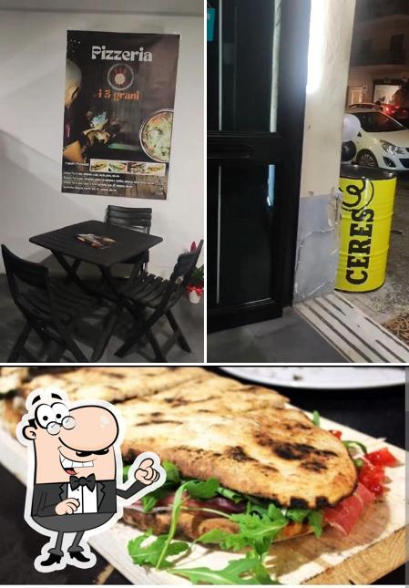 Questa è la foto che mostra la interni e cibo di Pizzeria i 3 Grani
