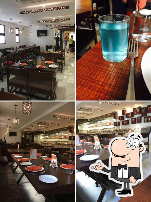 Take a seat at one of the tables at Sigree Annanagar