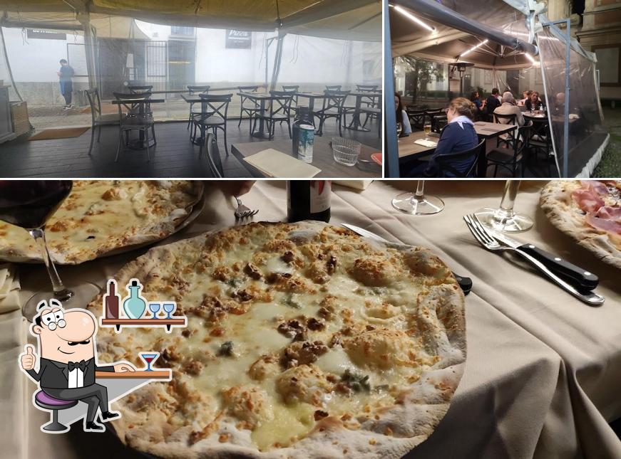 La foto di interni e cibo da Original Pizza Ok