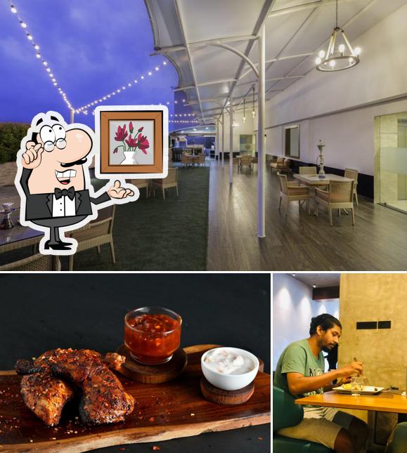 Check out the image displaying interior and food at Grill Republic- Barbecue & Sheesha Diner