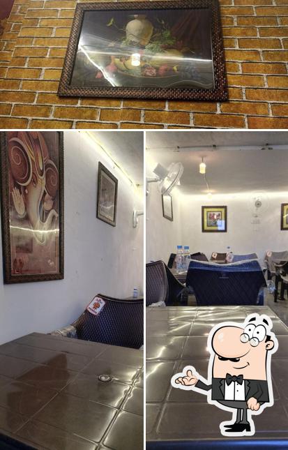 Take a look at the photo showing interior and food at Red zone - fast food and Chinese grill