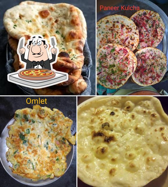 Order pizza at PRABHAT HINDU HOTEL