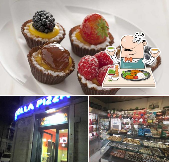 Questa è la immagine che raffigura la cibo e interni di L' Angolo Bar