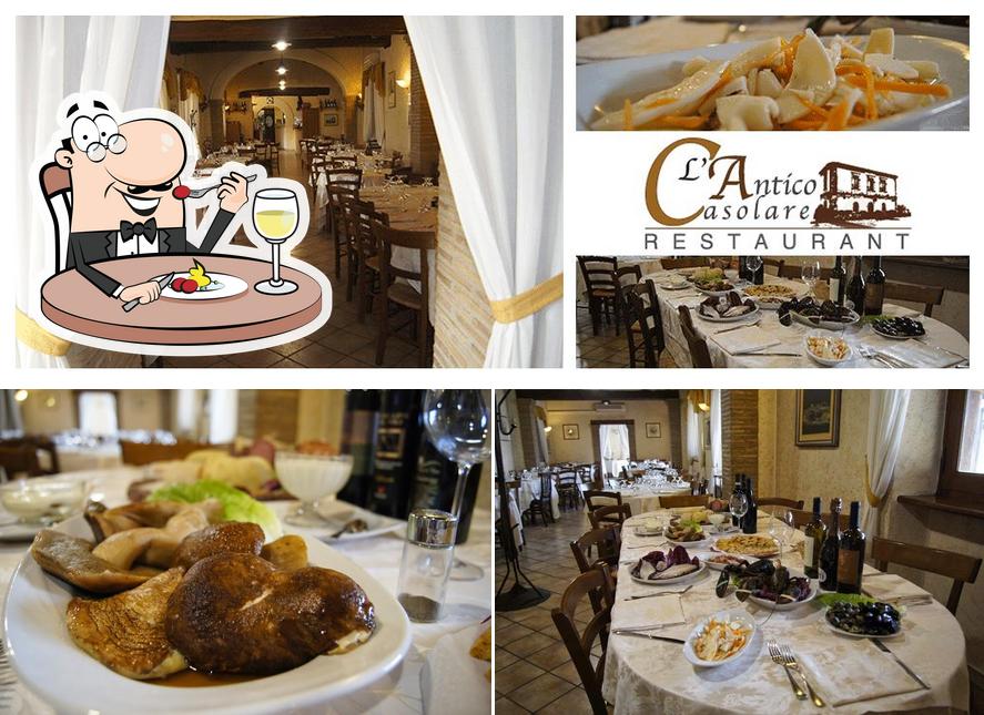Questa è la immagine che mostra la cibo e tavolo da pranzo di L'Antico Casolare di Cantalupo in Sabina