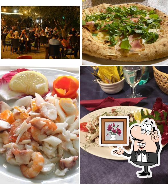 Dai un'occhiata agli interni di Ristorante Pizzeria CARPE DIEM
