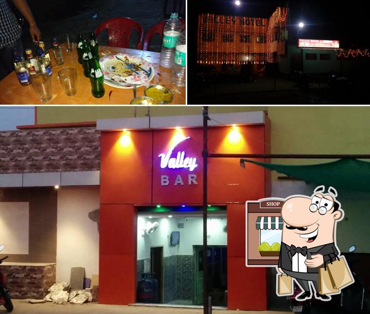 Take a look at the photo depicting exterior and dining table at Valley Hotel & Restaurant Cum Bar