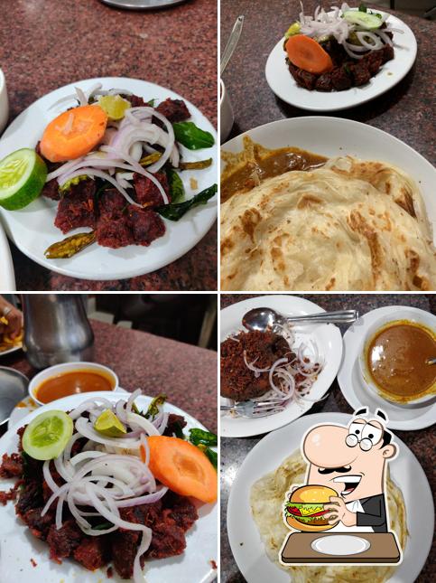 Order a burger at Hotel Raahath