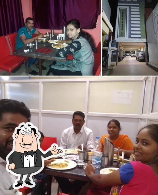 Take a seat at one of the tables at Ruchi Restaurant