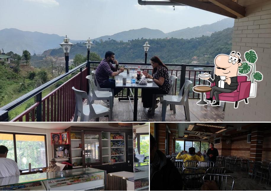 Take a seat at one of the tables at Modern Dhaba