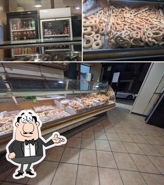 Guarda la immagine che raffigura la interni e cibo di "Il Fornaio" di Pierri Marianna