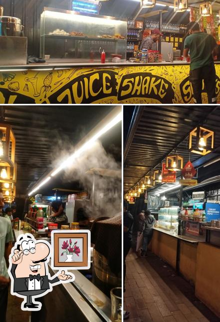 Take a seat at one of the tables at Mocca cafe