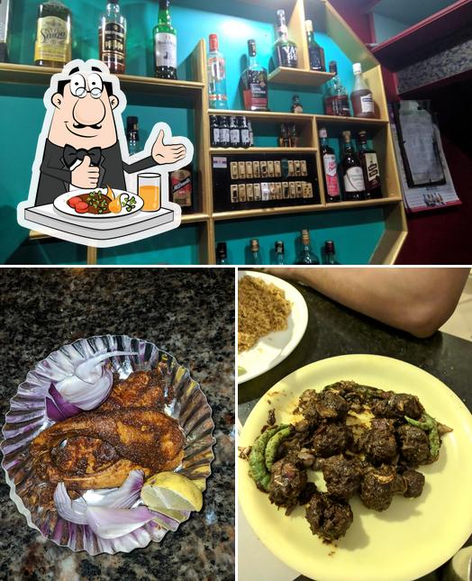This is the picture displaying food and beer at Mandavi Bar & Restaurant