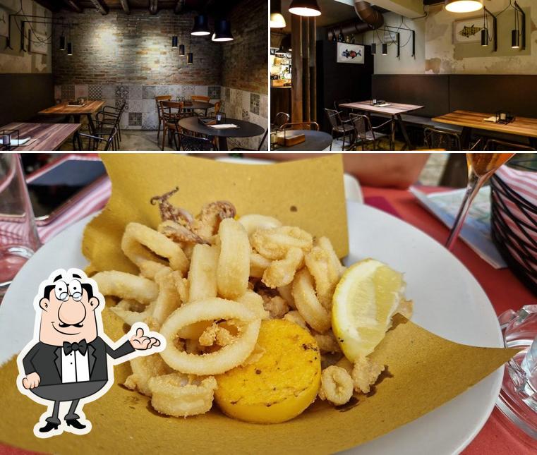 Questa è la foto che mostra la interni e cibo di Acquasalsa