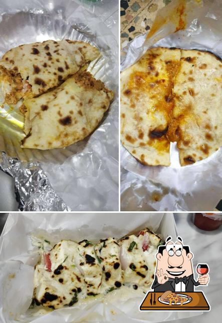 Try out pizza at Curry Culture