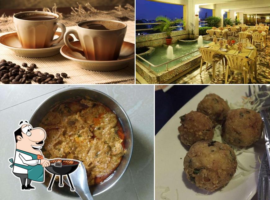 Get meat dishes at Hotel Atithi's Roof Top Restaurant