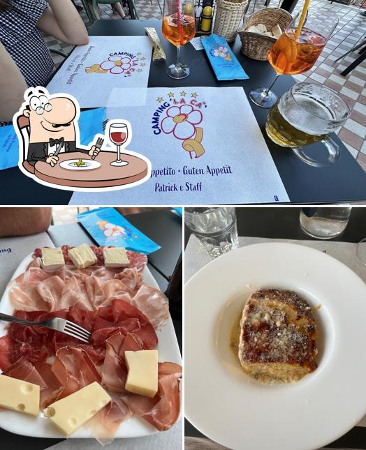 Tra le varie cose da Ristorante Pizzeria La Cà si possono trovare la cibo e interni