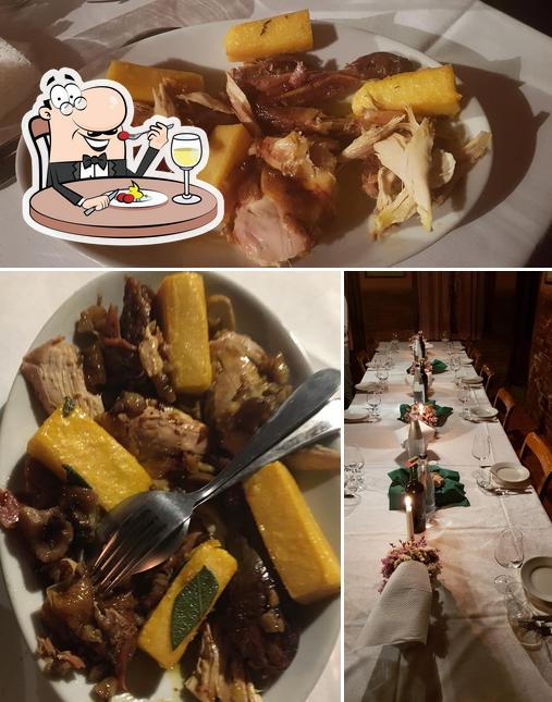 Trattoria Filippetto si caratterizza per la cibo e tavolo da pranzo