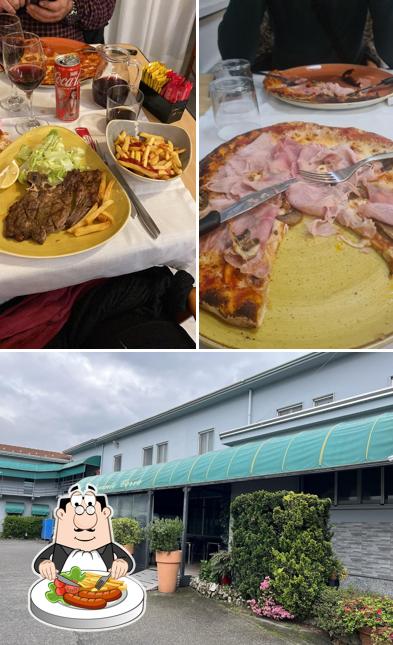 La immagine di cibo e esterno da Restaurante @ HOTEL RISTORANTE CERVO