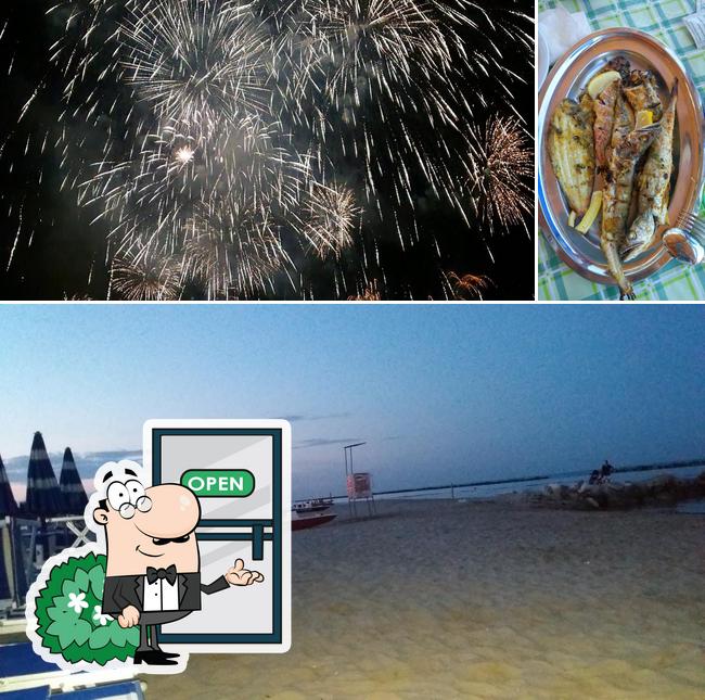 Dai un’occhiata alla immagine che raffigura la esterno e frutti di mare di Chalet Bagni Andrea