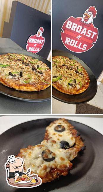 Try out pizza at Broast N Rolls