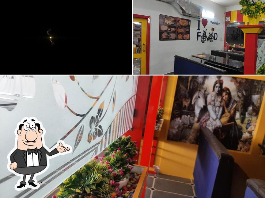 This is the photo displaying interior and exterior at Dev Darbar family dhaba