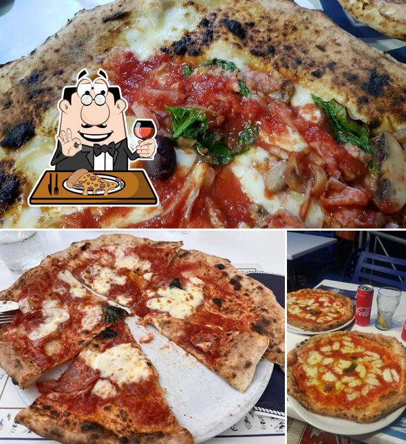 A Pizzeria bar Nuovo Da Silvio, puoi ordinare una bella pizza