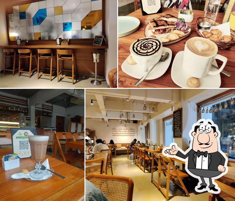 Take a seat at one of the tables at Le Cafe Best European Cafe in Chembur, Mumbai
