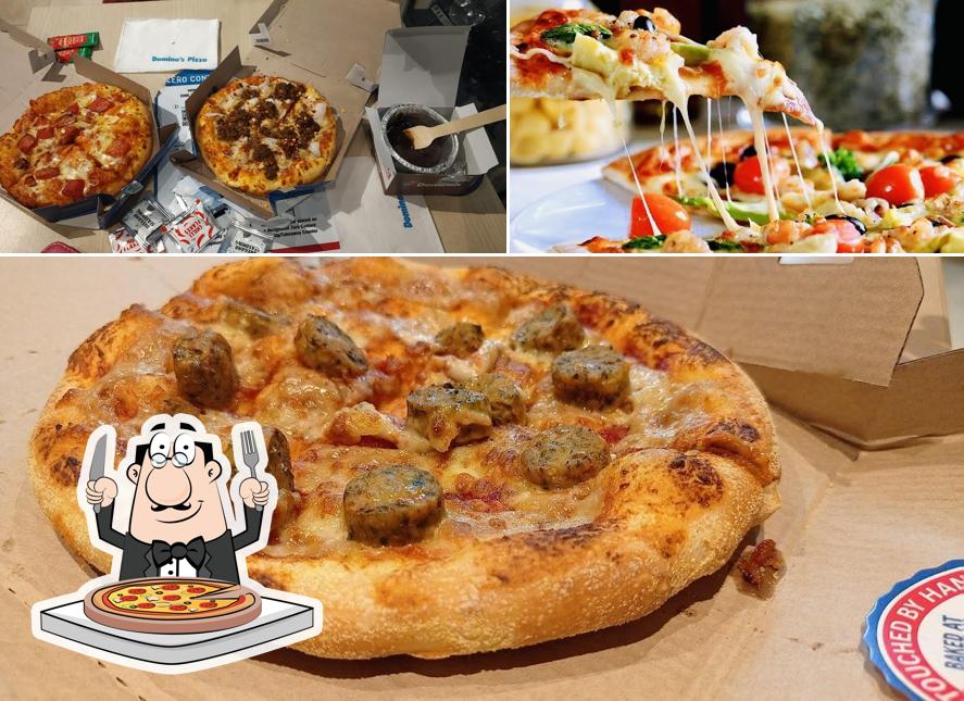 Pick pizza at Domino's Pizza