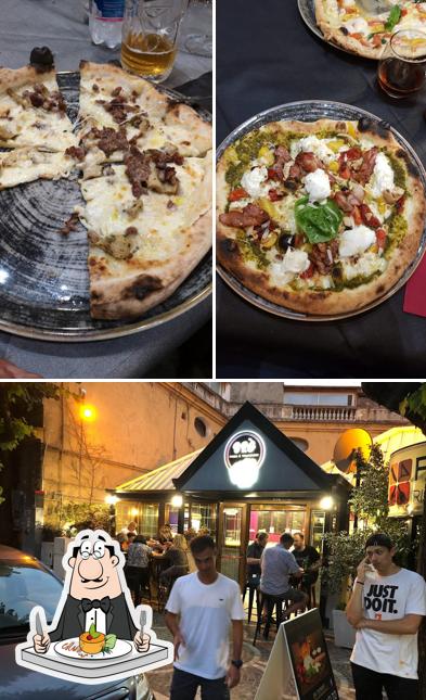Questa è la foto che mostra la cibo e esterno di Pizzeria Brò