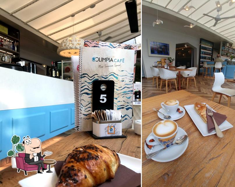 Dai un'occhiata agli interni di Olimpia Cafè