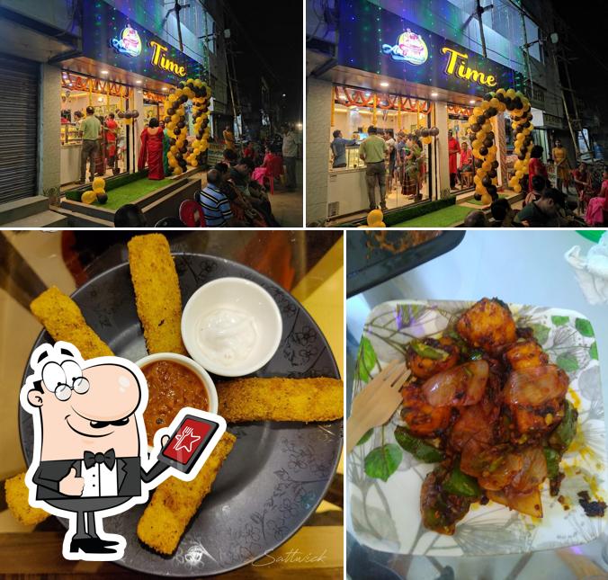Check out the image displaying exterior and food at Ambience Time&Henshel