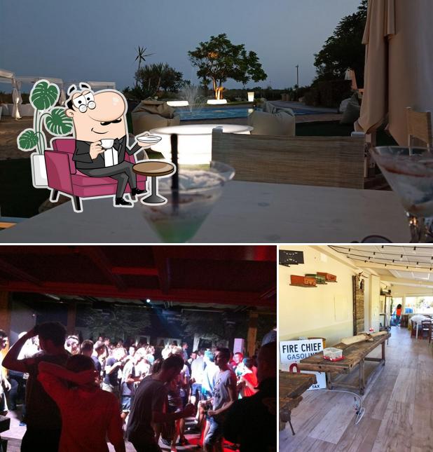 Guarda la foto che presenta la interni e tavolo da pranzo di Ristorante - Sound Beach