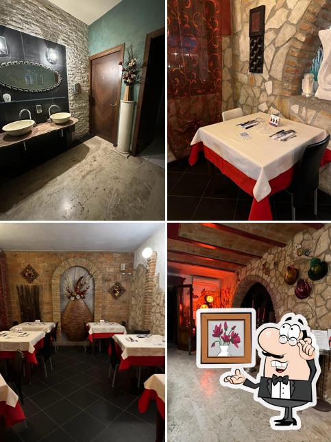 Dai un'occhiata agli interni di Pizzeria Rosso di sera