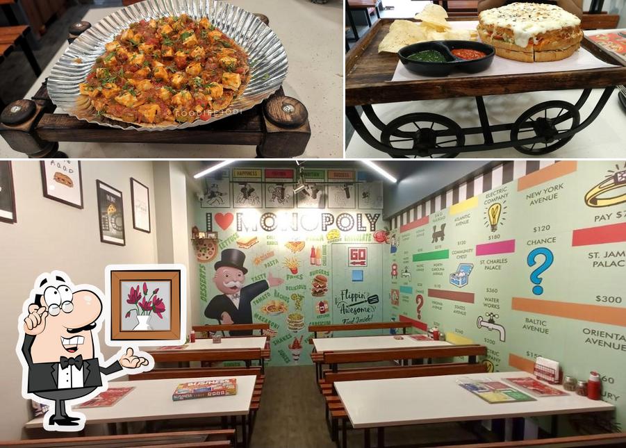 The restaurant's interior and pizza