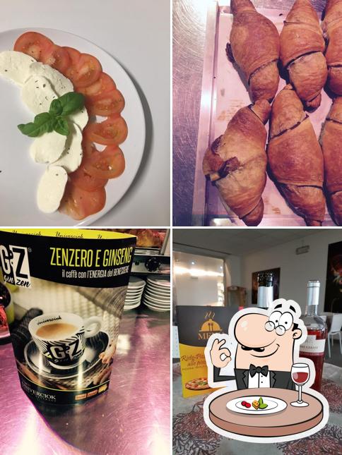 Questa è la immagine che mostra la cibo e bevanda di Risto-Pizza Boy