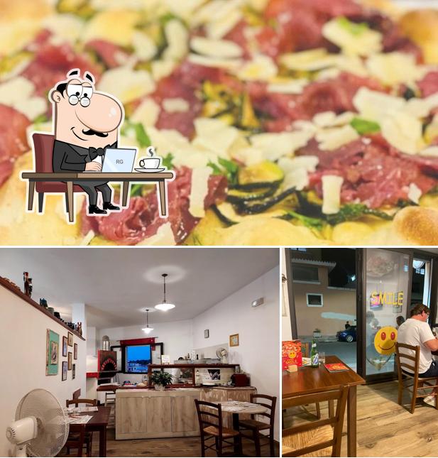 La immagine della interni e cibo di Pizzeria Smile