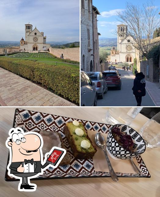 Dai un’occhiata alla foto che mostra la esterno e bevanda di Ghiotto Ristorante - Assisi