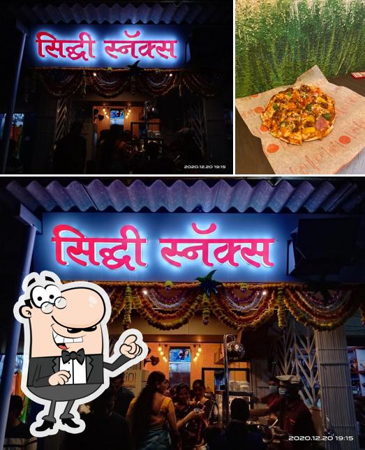 Siddhi Snacks is distinguished by exterior and pizza
