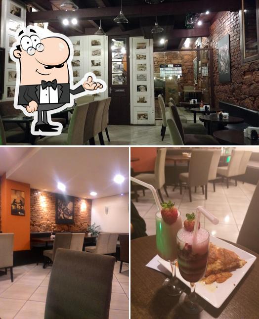Sente em uma das mesas no Café de Minas