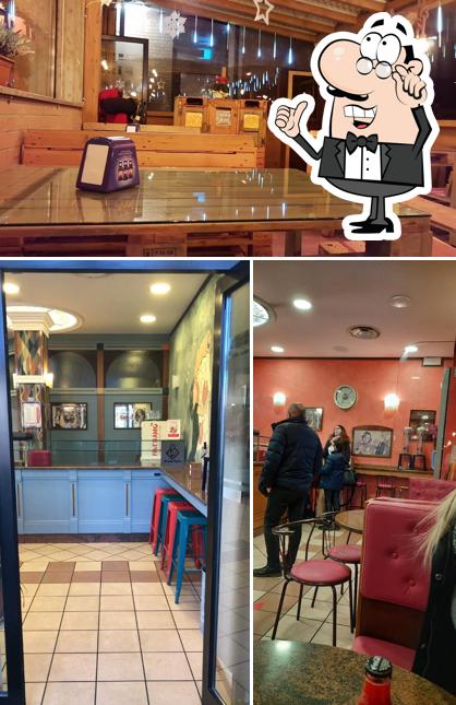 Siediti a un tavolo di Pizza Time