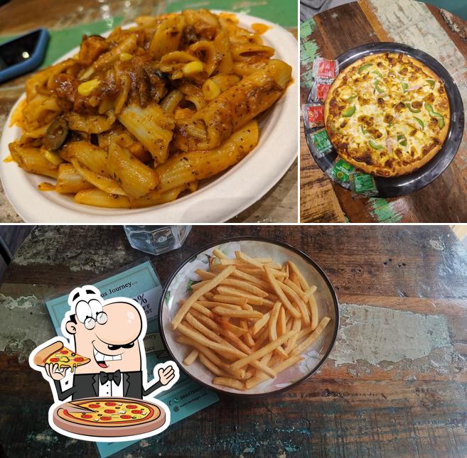 Try out pizza at Nostalgia Cafe