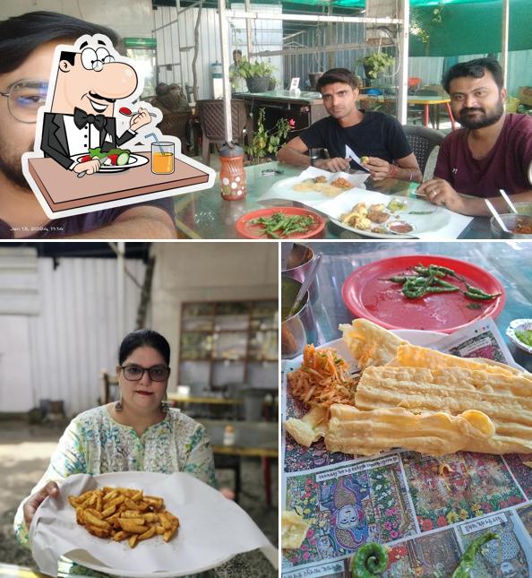Bajrang Gathiya Bhajiya House (Junagadhvala) is distinguished by food and interior