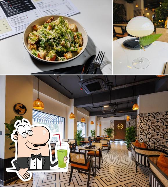 Enjoy a drink at Hola Bar & Cafe