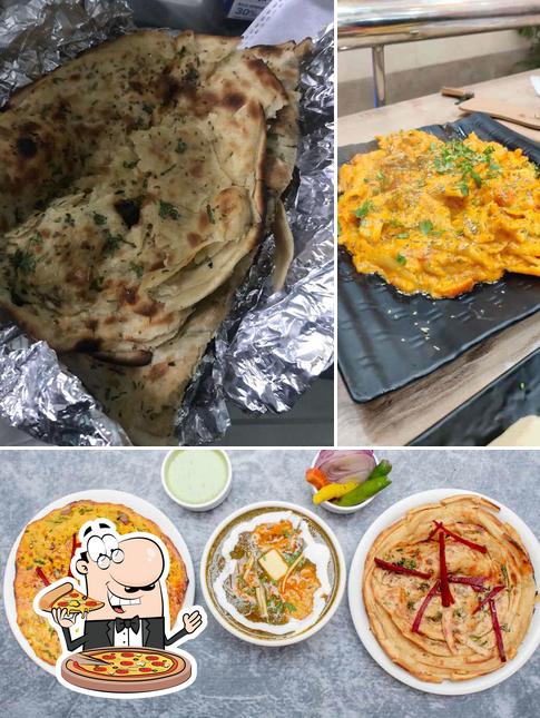 Try out pizza at Ramji Di Hatti & Caterers