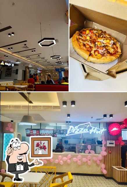 Among various things one can find interior and seo_images_cat_37 at Pizza Hut Salarpur, Gajraula