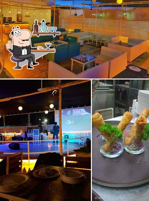 Take a seat at one of the tables at FML - Food Music Love (Pashan)