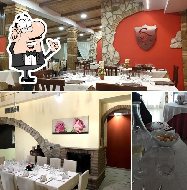 Questa è la foto che presenta la interni e tavolo da pranzo di Le Nuove Leve