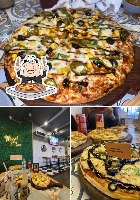 Pick pizza at Size Zero Cafe Restro