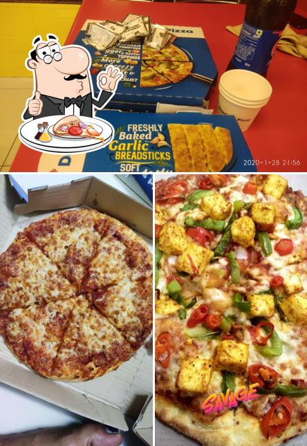 At Domino's Pizza Ram Nagar, Dombivli East, you can enjoy pizza