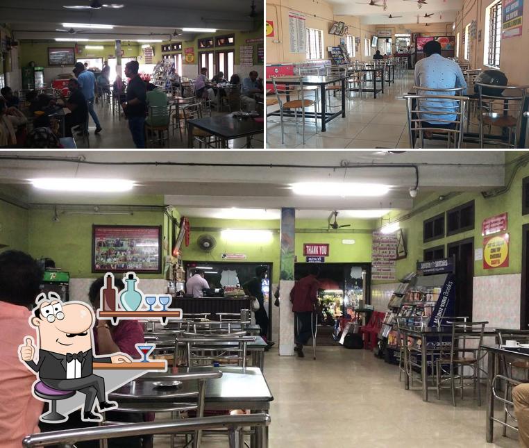 Take a seat at one of the tables at Indian Coffee House